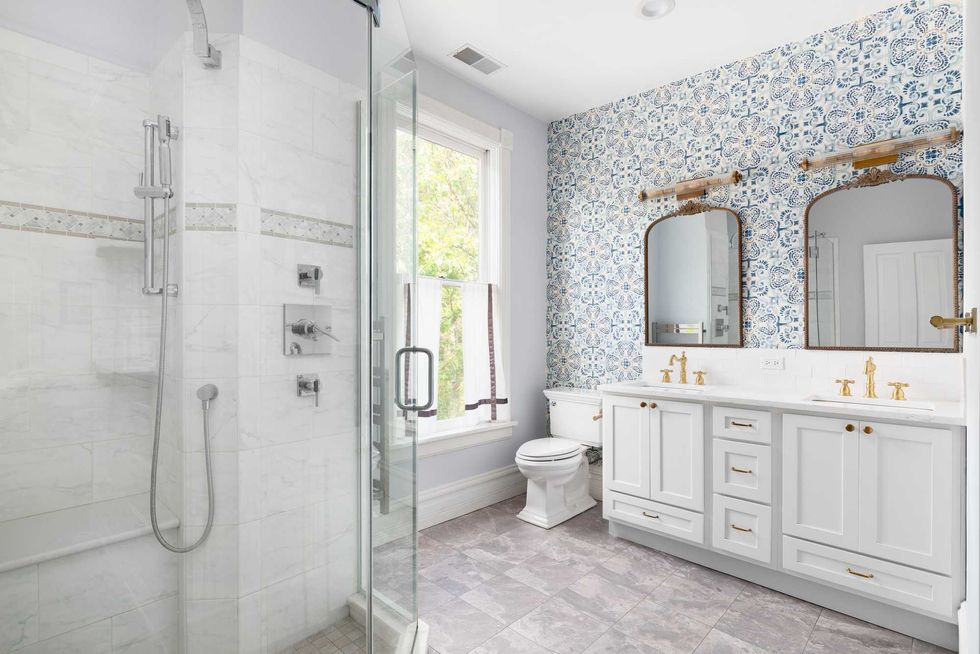bathroom with blue and white wallpaper