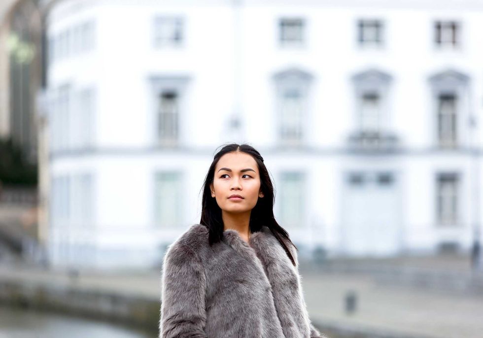 Beautiful portrait of fashionable asian woman in winter clothes