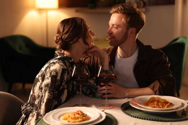 Date. Couple having romantic dinner in restaurant