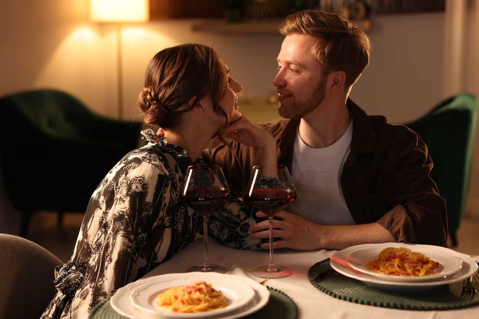 Date. Couple having romantic dinner in restaurant
