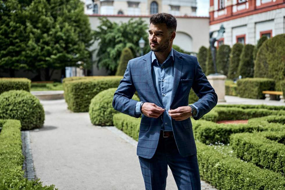 Handsome stylish man in a classic navy blue suit