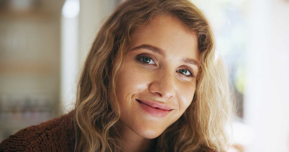 Happy woman, portrait and morning with self confidence or natural beauty in satisfaction at home. Face of young female person or freelancer with smile for positive attitude, style or future at house.