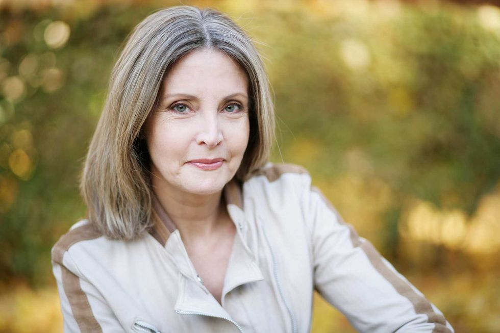 pretty middle-aged woman in the park