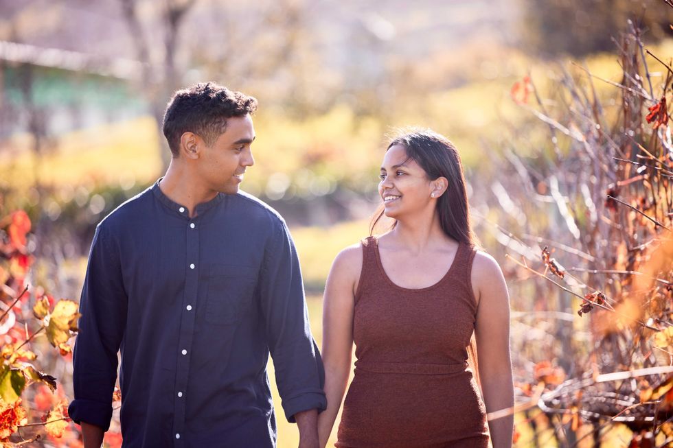 Shot of a young couple having a date on a wine farm.