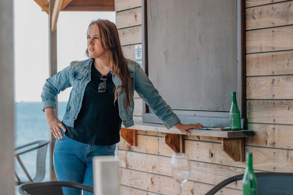 woman at the beach bar in summer
